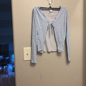 Selling a white blue cover up blouse like texture